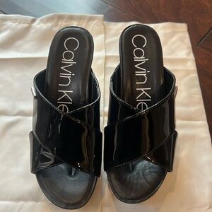 Calvin Klein black leather wedges. Size 6.5
